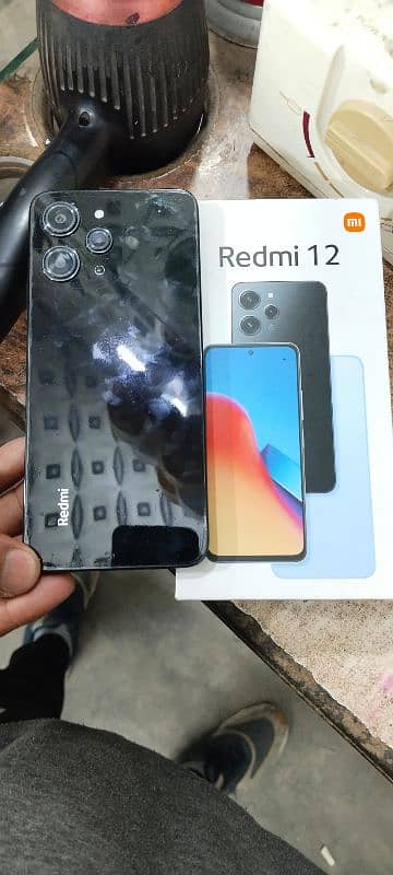 new mobile hai redmi 12 dibba sub kuch sath hai 10 by 10 candition 2