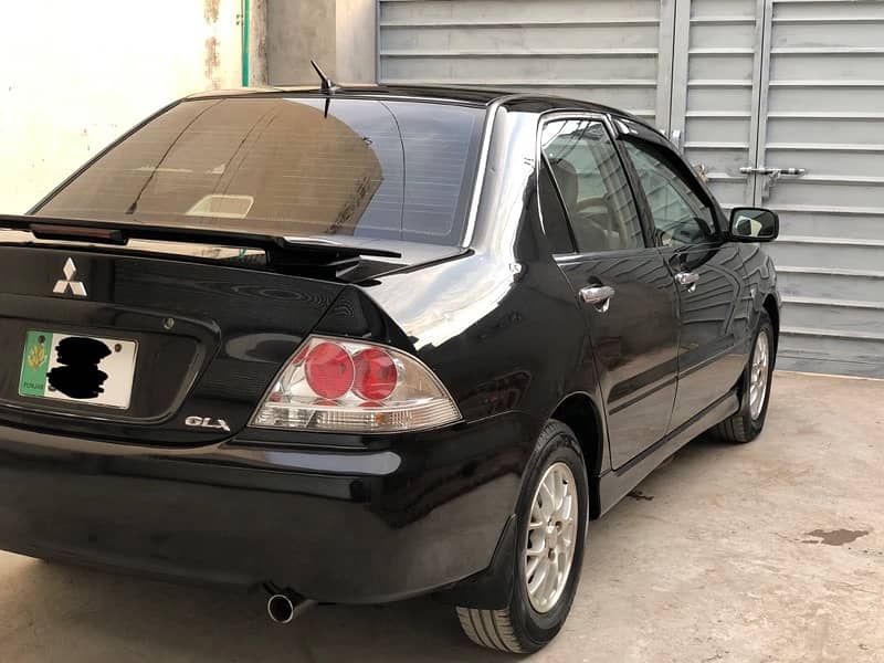 Mitsubishi Lancer total genuine2004/5 btr thn city corollaalto wagonr 2