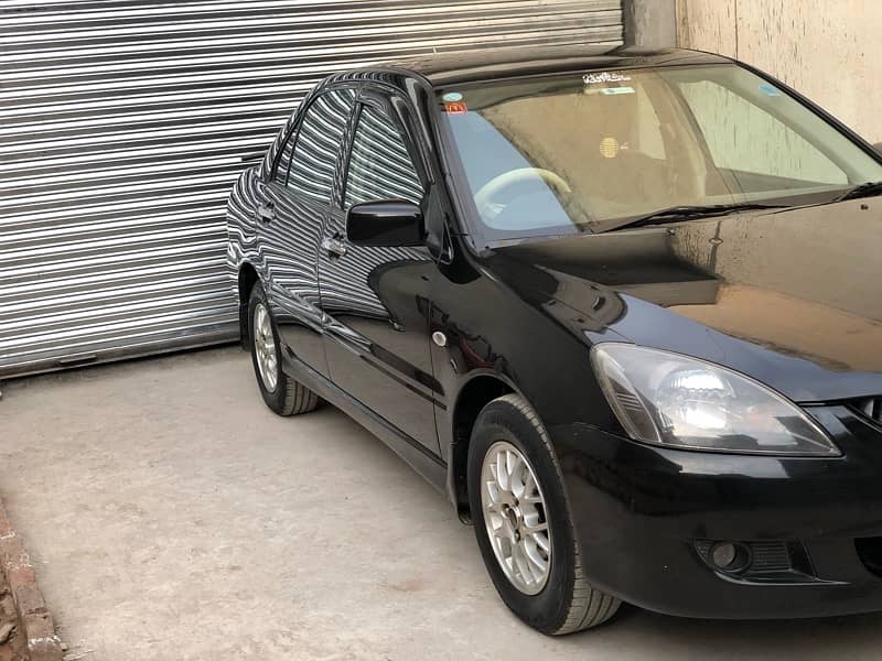 Mitsubishi Lancer total genuine2004/5 btr thn city corollaalto wagonr 3