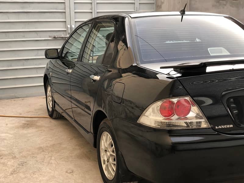 Mitsubishi Lancer total genuine2004/5 btr thn city corollaalto wagonr 4