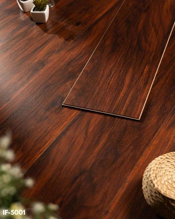 Wooden and vinyl flooring with installation services 0