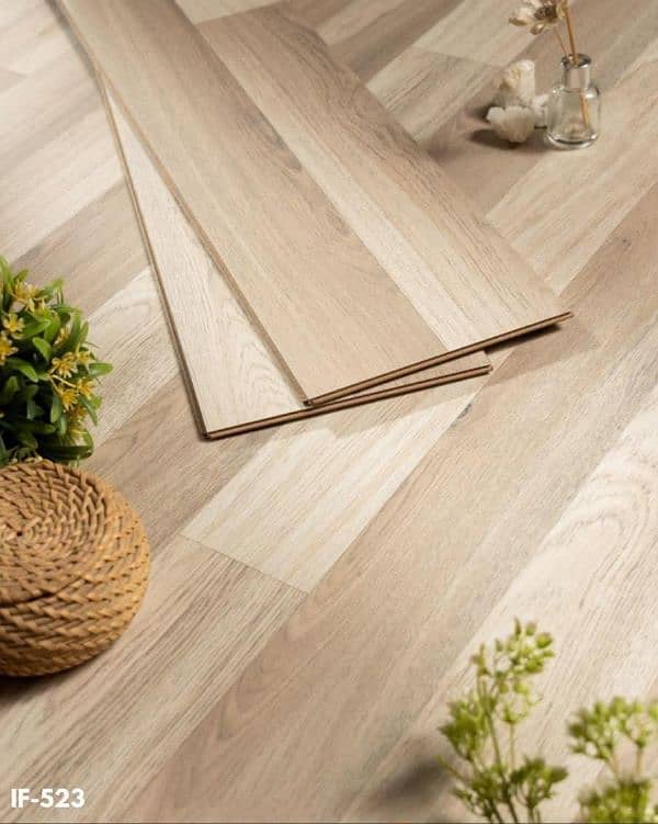 Wooden and vinyl flooring with installation services 10