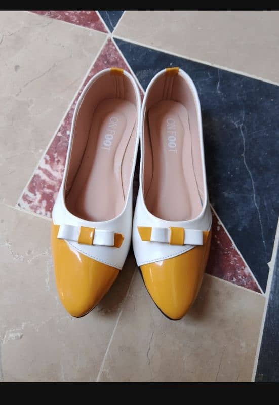 Woman's Rexine Fancy Pump's 7