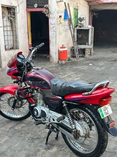 honda deluxe 125  red colour kick start  brand new condition