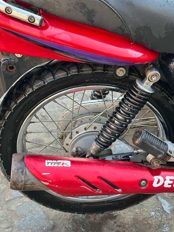 honda deluxe 125  red colour kick start  brand new condition 7