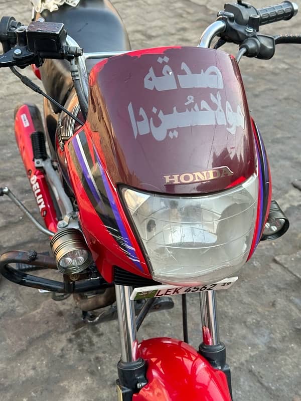 honda deluxe 125  red colour kick start  brand new condition 8