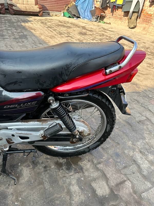 honda deluxe 125  red colour kick start  brand new condition 11