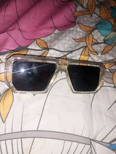 pack of three sunglasses new condition colour black purple