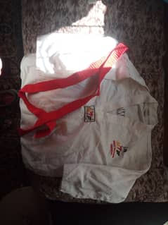 Size 4 made in Pakistan taekondo uniform with red belt