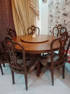 pure wood k dinning table with 6 chenoite chairs