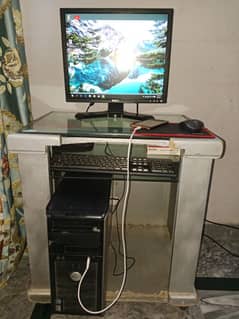 core 2 duo with table keyboard mouse