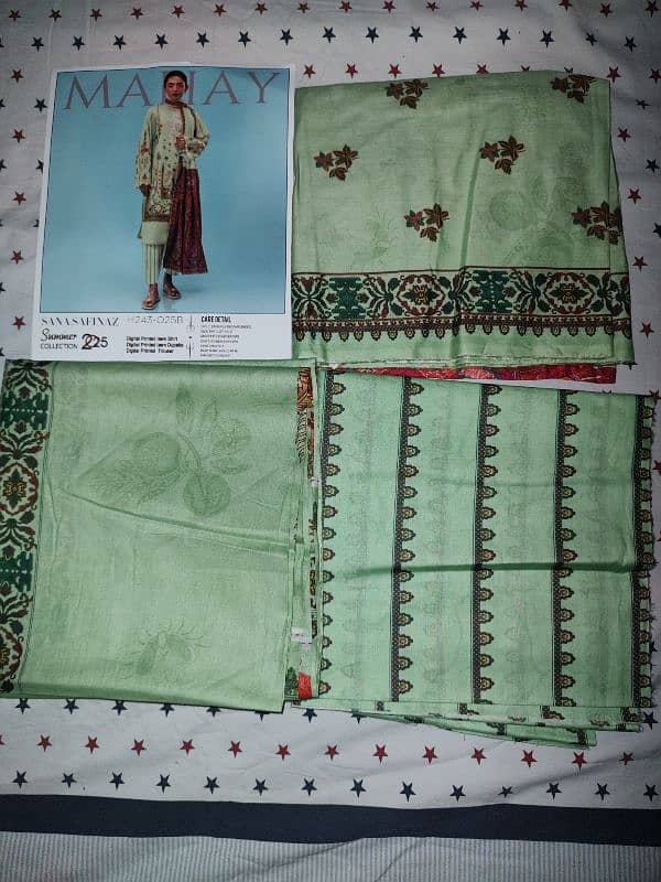 Unstitched Lawn 3 Piece or 2 Piece. 11