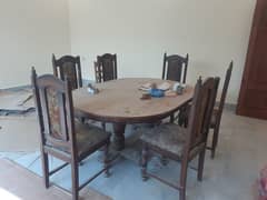 I am selling dining table with 6 chair set . this is used but in good