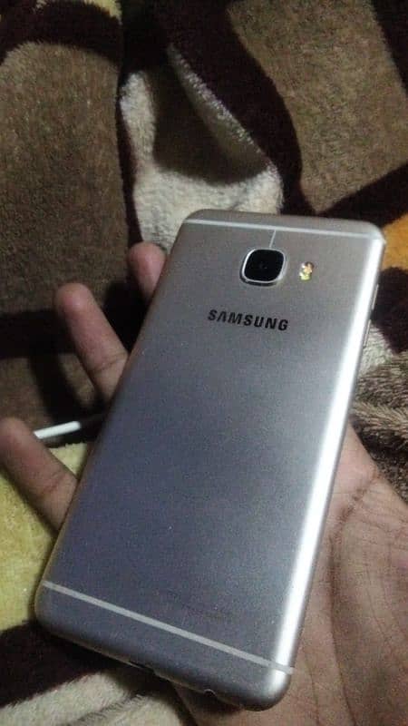 Samsung c5 4gb / 32gb  AMOLED display front finger all okay only phone 0