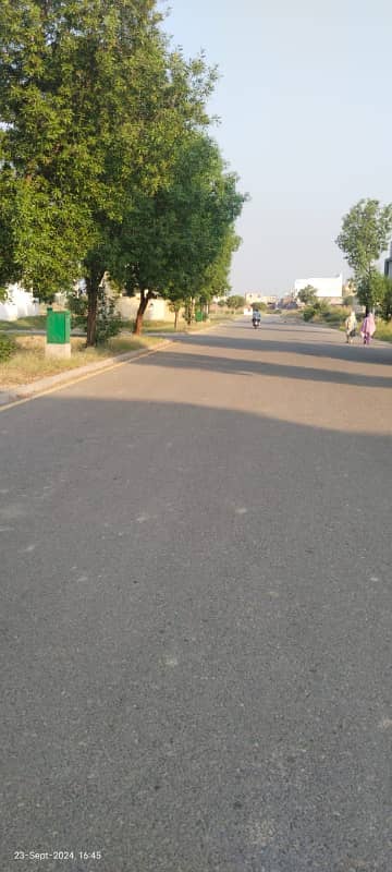 10 MARLA ON GROUND CORNER 60 FEET ROAD PLOT ON CARPETED ROAD WITH ALL DUES PAID & PRIME LOCATION VERY NEAR BY CORNERSTONE SCHOOL FOR SALE IN NEW LAHORE CITY PHASE 2 3