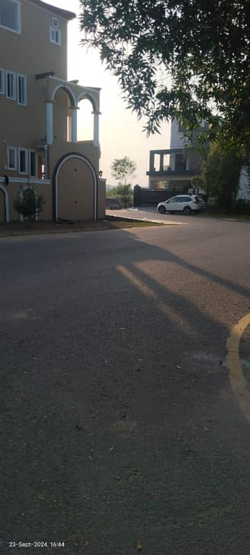 10 MARLA ON GROUND CORNER 60 FEET ROAD PLOT ON CARPETED ROAD WITH ALL DUES PAID & PRIME LOCATION VERY NEAR BY CORNERSTONE SCHOOL FOR SALE IN NEW LAHORE CITY PHASE 2 4