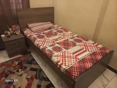 2 single bed with mattess and side table