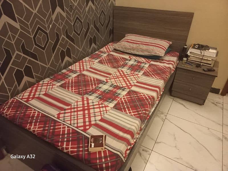 2 single bed with mattess and side table 1