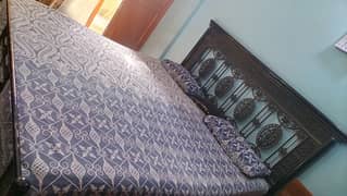 Iron rod bed with mattress