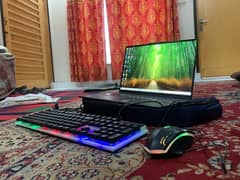 Lenovo Laptop Yoga Gaming Beast with gaming keyboard and mouse