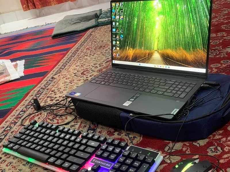 Lenovo Laptop Yoga Gaming Beast with gaming keyboard and mouse 1