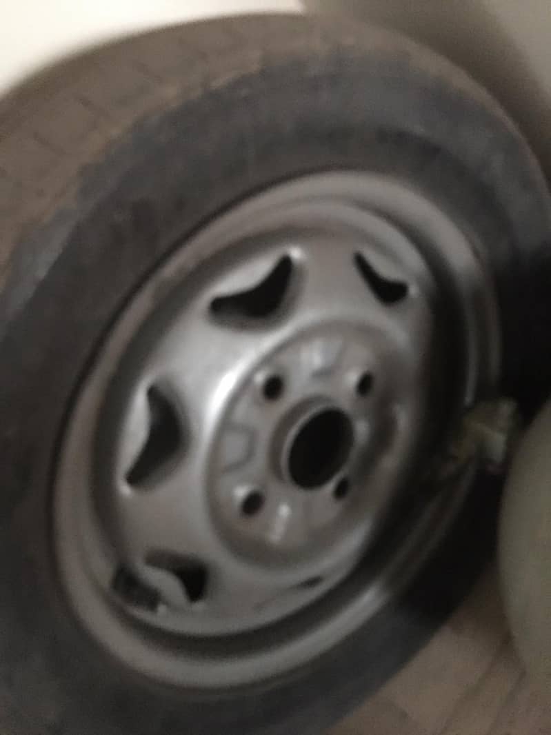 13 inch tubless tyre with rim  Mehran Cultus alto etc 0