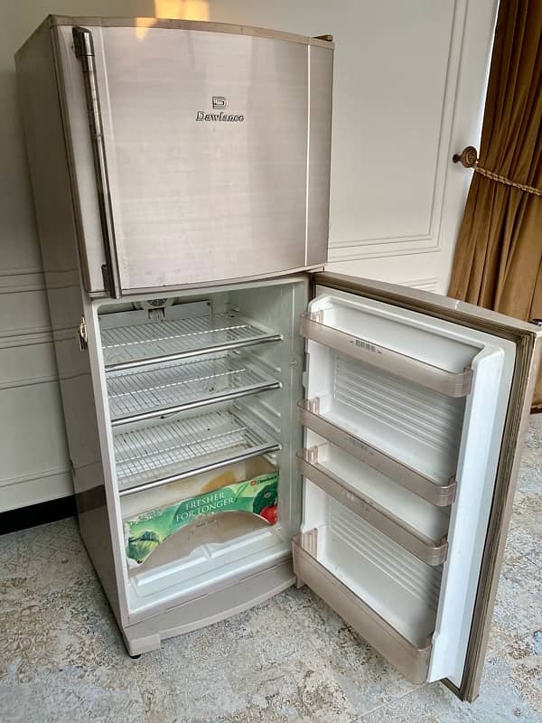 3 door closet and Dawlance Fridge (Medium Size) 3