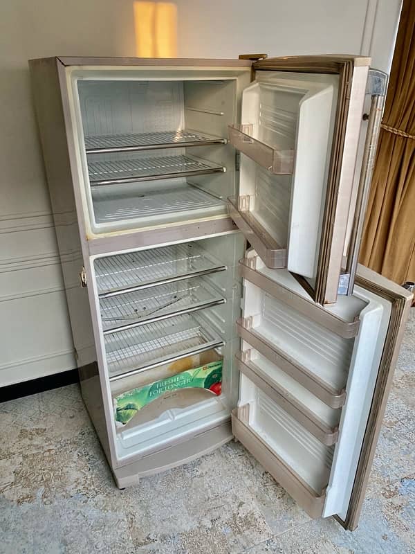 3 door closet and Dawlance Fridge (Medium Size) 4