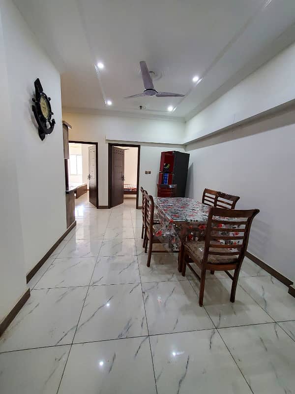 Dha Ph 6 | Ittehad Com Aera | Fully Furnished | 2-Bed Dd Apartment | Prime Location | Modern Amenities | Family-Friendly Neighborhood | Already Rented | Also Available On Bank Loan | Reasonable Demand | 9