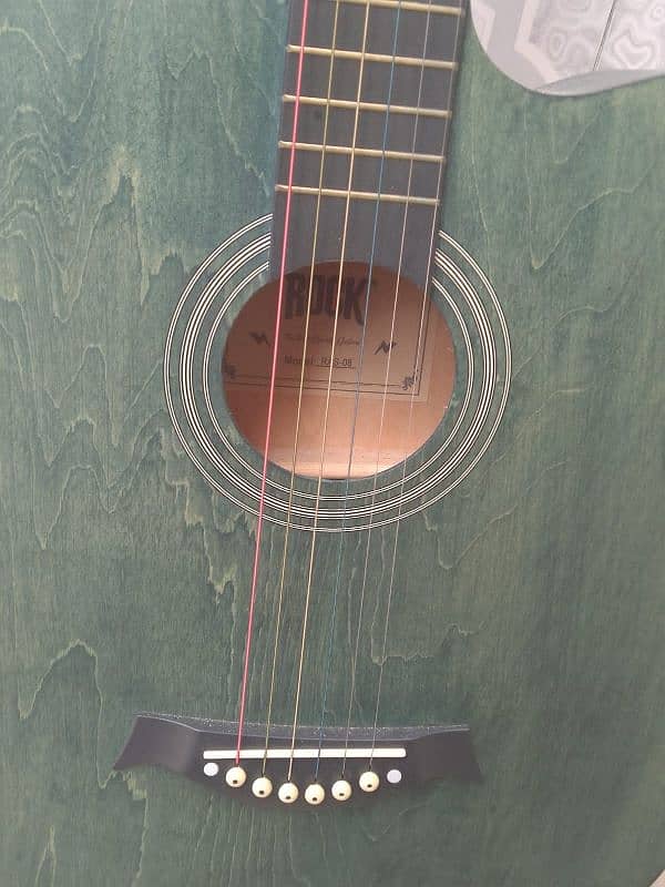 Acoustic guitar imported brand name Rock 7