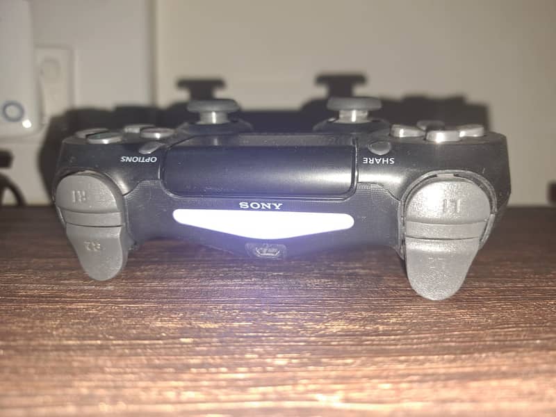 PS4 1TB with Controller| 10/10 Condition + NFS Heat Game 7