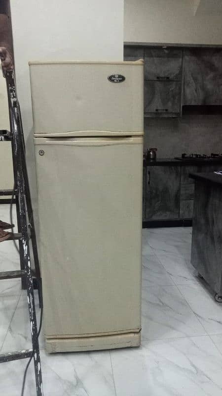 off white good condition fridge 0