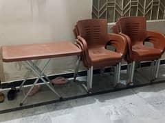 plastic chairs and table for sale