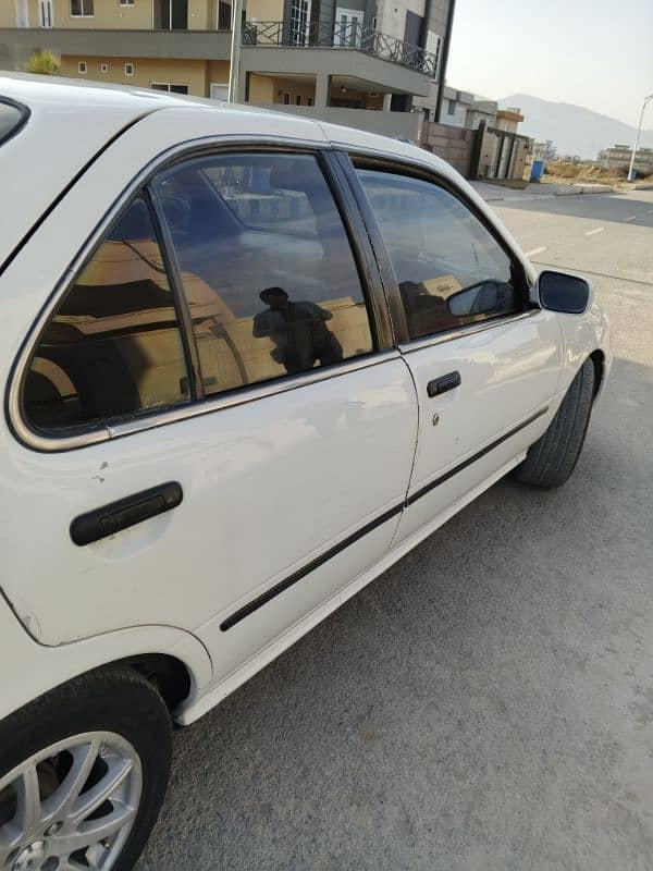 Nissan Sunny 2000 A. C, CNG 4