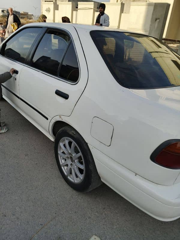 Nissan Sunny 2000 A. C, CNG 6