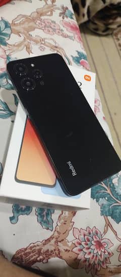 almost brand new scratch less Redmi 12 reasonable price