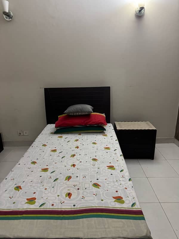 single wooden bed 2