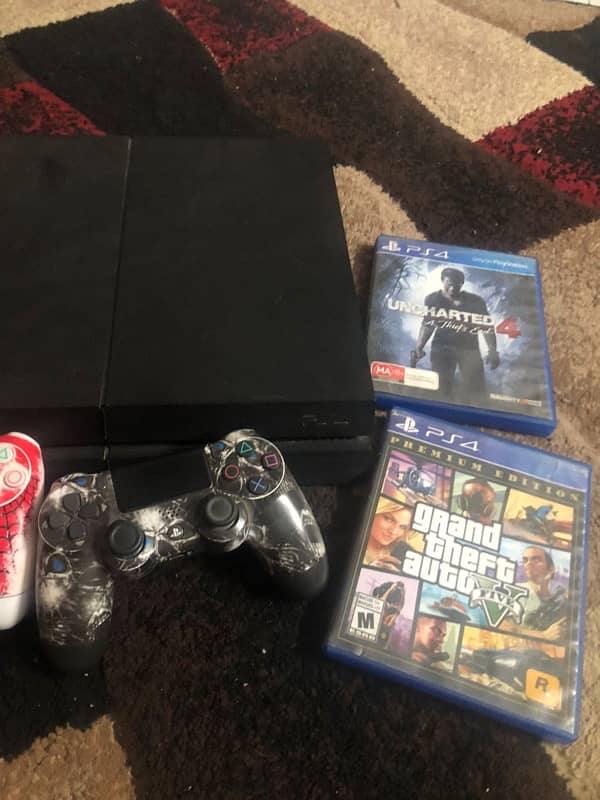 Ps4 1200 series with 2 controller and games 0