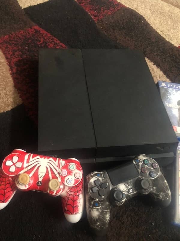 Ps4 1200 series with 2 controller and games 1