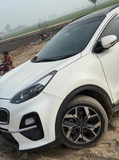 Kia Sportage2023 frunt weel first owner b/b genie