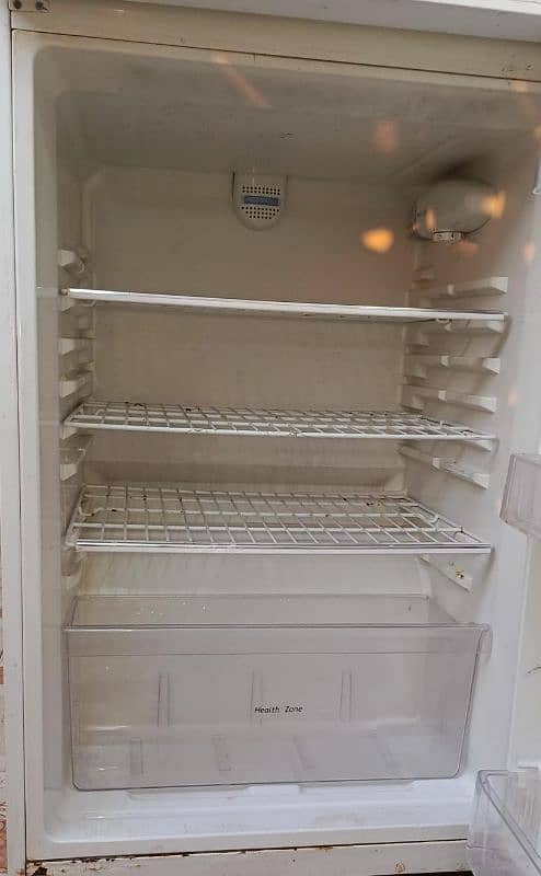 Sell Refrigerator running and good condition 2