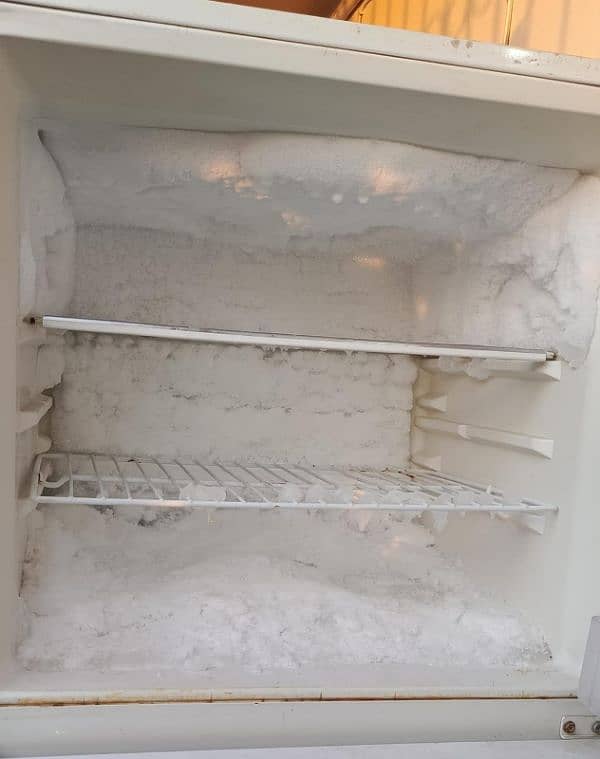 Sell Refrigerator running and good condition 5