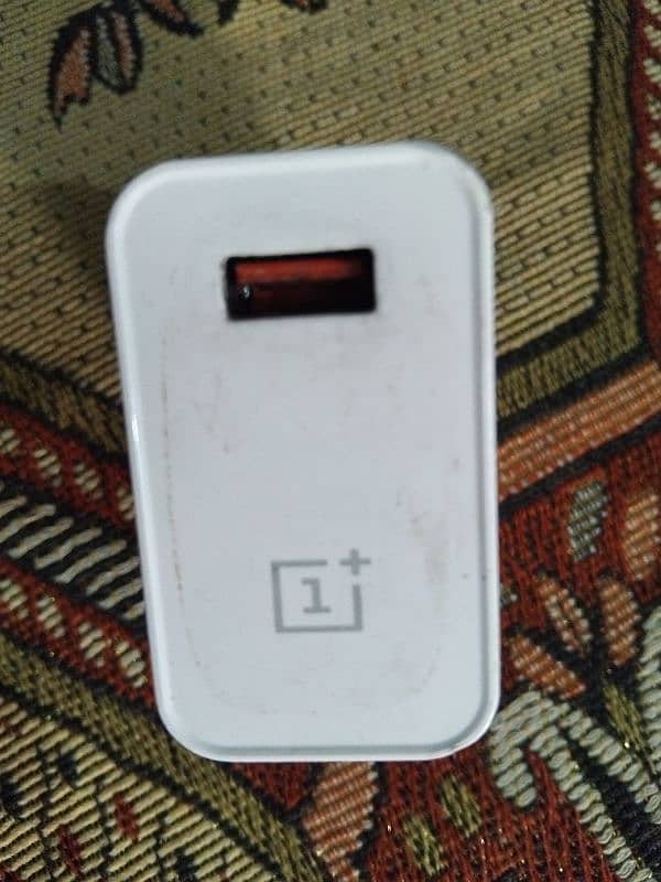 One plus original 30W charger in good condition 0