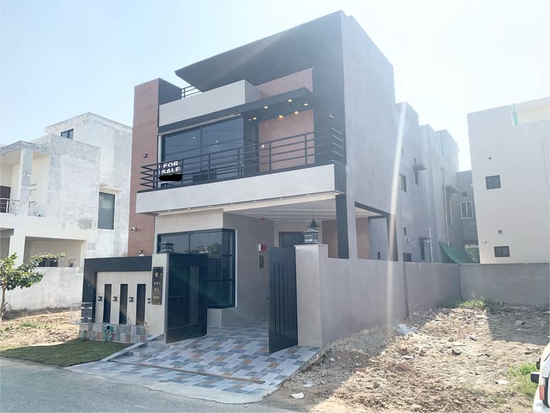 5 MARLA 4 BEDROOM BRAND NEW MODERN DESIGN HOUSE IS AVAILABLE FOR SALE IN DHA PHASE 11 RAHBAR LAHORE 0