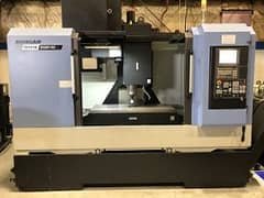 CNC Machining Center Operator