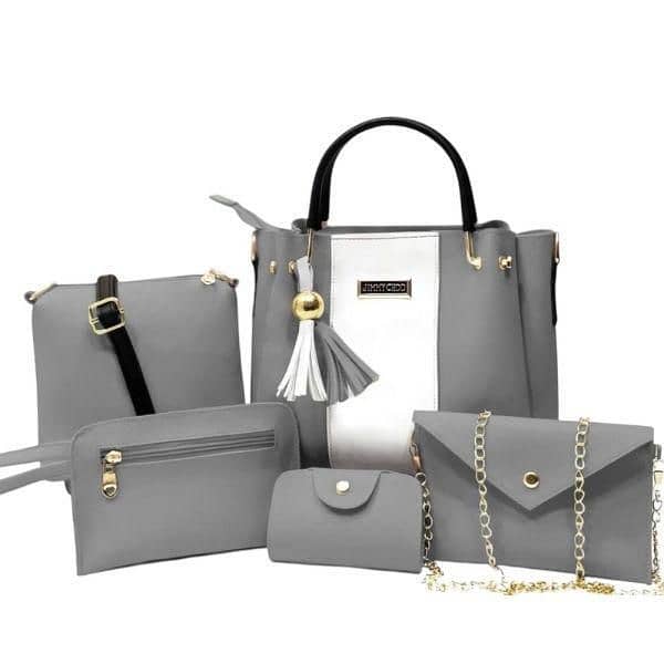 Stylish women leather handbag set. 0