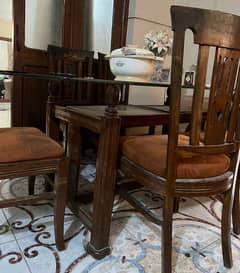 Heavy wooden dining table with 6 chairs