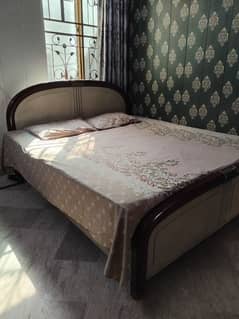 Double bed with dressing and side tables