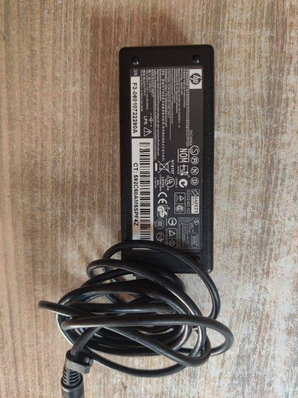 HP laptop Adopter 18.5V . . . 65watt 0