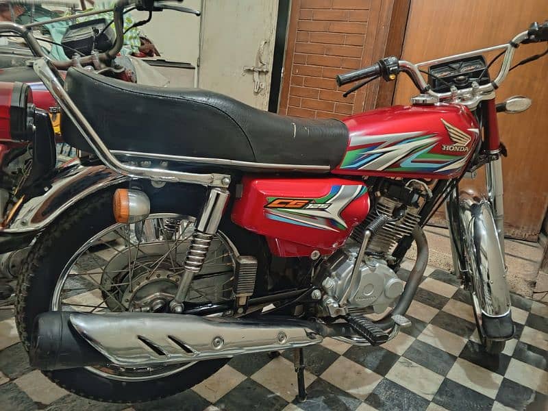 Honda cg 125 2023 model heqd side pack (open letter) 1